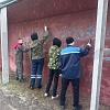 В Армавире волонтёры закрасили рисунки и надписи наркотического характера на заборах