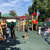 В поселке Заветном после обновления торжественно открыли детскую площадку 